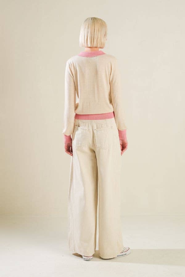 A solid sweater knit polo